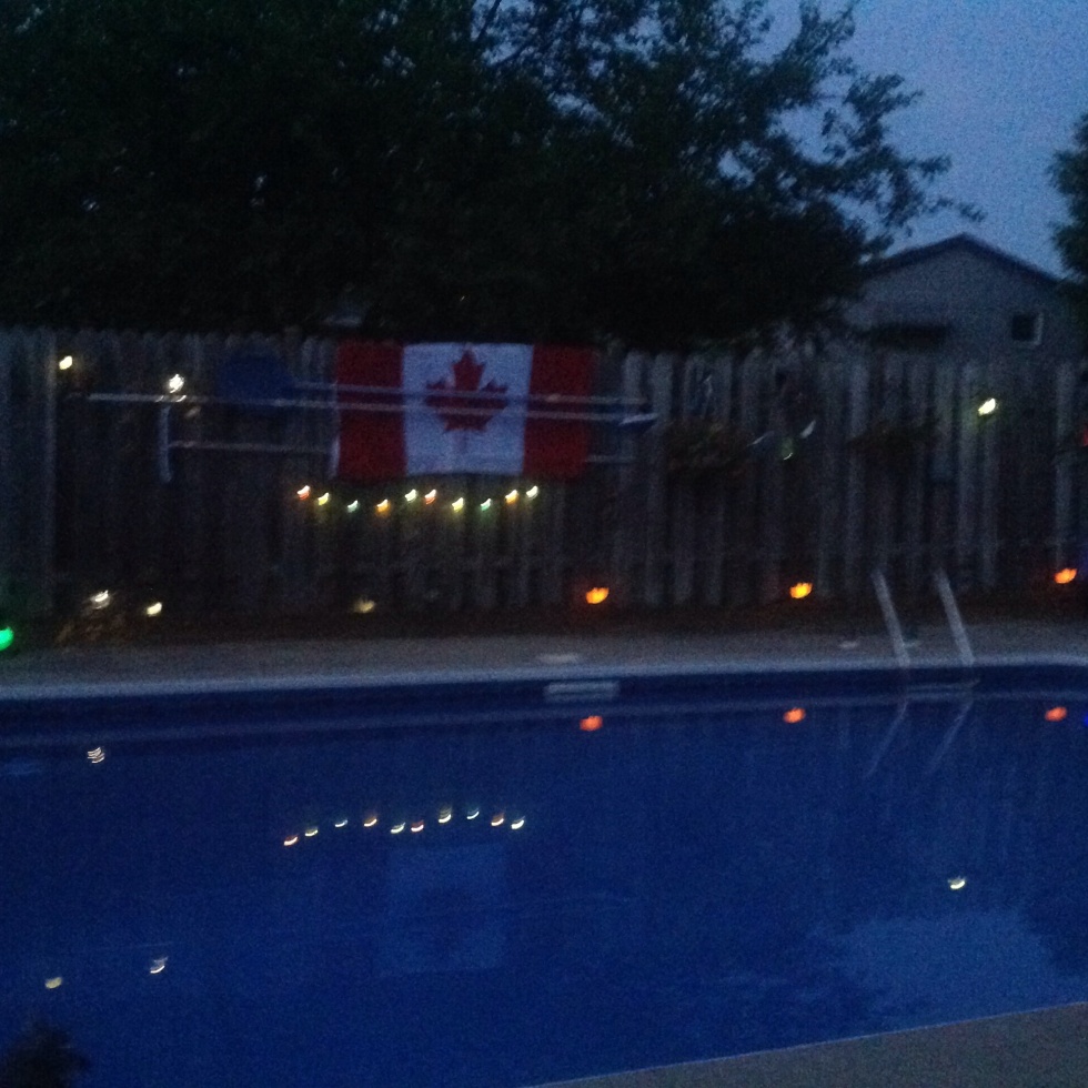 Canada flag over pool